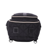 Bottom view of Aerolite backpack with quilted fabric and reinforced base, ensuring durability and stability for travel and daily use.